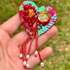 Heart-Shaped Sequin Brooch with Red and Gold Accents